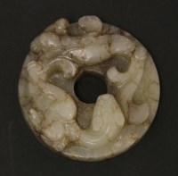 Lot 1190 - A Chinese jade bi disc