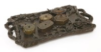 Lot 1292 - A collection of five Chinese metal water droppers