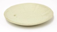 Lot 1042 - A Chinese white-glazed saucer