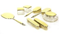 Lot 708 - A silver and enamel dressing table set