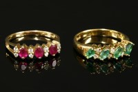 Lot 741 - An 18ct gold four stone marquise cut emerald and diamond ring