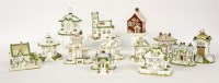 Lot 700 - Thirteen Coalport cottage pastille burners