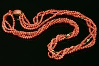 Lot 708 - A four row coral bead torsade