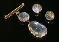 Lot 131 - An Edwardian two stone moonstone pendant/brooch