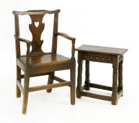 Lot 1004 - An oak armchair