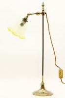 Lot 578 - An electric Edwardian adjustable brass desk light