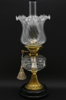 Lot 584 - An Edwardian brass and glass oil lamp