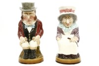 Lot 546 - A pair of pottery toby jugs