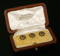 Lot 205 - A set of three French gold dress studs