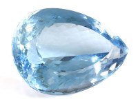 Lot 412 - An unmounted pear cut blue topaz