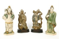 Lot 722 - A Chinese pottery figure of a scholar