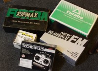 Lot 317A - A quantity of model aircraft and boat radio control unit