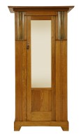 Lot 79 - An Arts and Crafts oak wardrobe