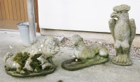 Lot 774 - A composite stone garden ornament