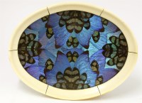 Lot 111 - An Art Deco oval ivory stand