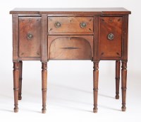 Lot 604 - A small Regency mahogany breakfront sideboard