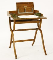 Lot 680 - A late 19th century oak folding campaign desk