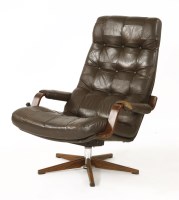 Lot 616 - A Scandinavian leather lounge chair