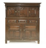 Lot 917 - An oak court cupboard