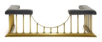 Lot 1157 - A brass club fender