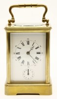 Lot 161 - A 20th century French brass and fire glass carriage alarm clock