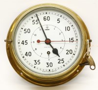 Lot 310 - A brass cased ship's bulkhead timepiece