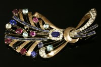 Lot 682 - A gold and silver gemstone spray brooch