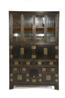 Lot 641 - A large black lacquered Chinese cabinet