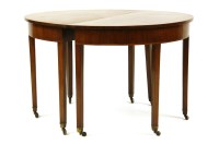 Lot 568 - A pair of George III mahogany demi lune side tables