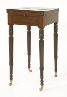 Lot 1119 - A Regency mahogany writing table