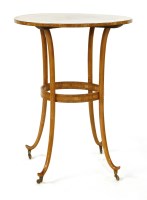 Lot 1072 - An unusual Edwardian satinwood circular lamp table