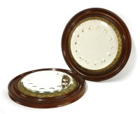 Lot 1162 - A pair of French mahogany wall mirrors