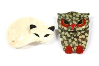 Lot 44 - A Lea Stein cream celluloid sleeping cat brooch with black eyes and ears