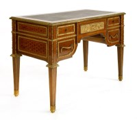 Lot 1210 - A mahogany gilt bronze-mounted bureau plat