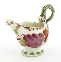 Lot 347 - A first period Worcester dolphin ewer cream boat