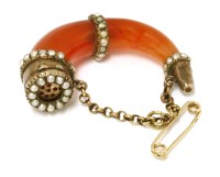 Lot 11 - A Georgian gold cornelian and seed pearl horn pendant vinaigrette