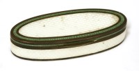 Lot 22 - An oval silver gilt and enamel pill box