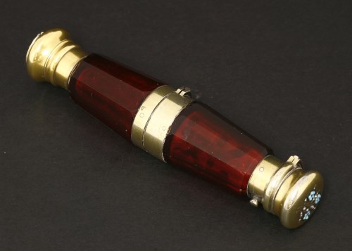 Lot 72 - A Victorian ruby glass double-ended scent bottle and vinaigrette
