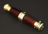 Lot 72 - A Victorian ruby glass double-ended scent bottle and vinaigrette
