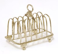 Lot 153 - A George III silver seven-bar toast rack
