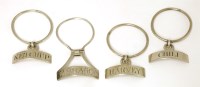Lot 121 - A set of three George III silver sauce labels