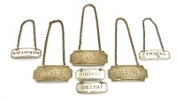 Lot 125 - A set of three Victorian silver wine labels