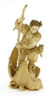 Lot 578 - A Japanese ivory okimono