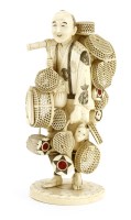 Lot 579 - A Japanese ivory okimono