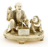 Lot 581 - A Japanese ivory okimono