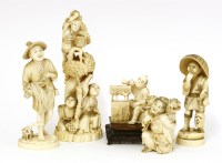 Lot 586 - A  group of Japanese ivory okimono