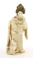 Lot 602 - A Japanese ivory okimono