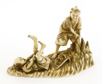 Lot 609 - A Japanese ivory okimono