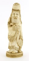 Lot 614 - A Japanese ivory okimono