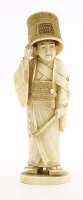 Lot 615 - A Japanese ivory okimono